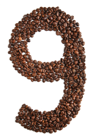 Number 9 from coffee beans isolated on white backgroundの写真素材