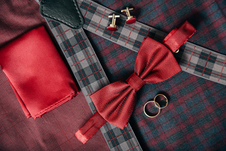 Men's accessories - bow tie, wedding rings, cufflinks on textile background.の写真素材