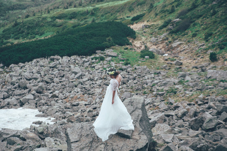 The bride in mountains. Weddingの写真素材