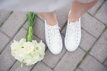 Wedding shoes and bouquetの写真素材