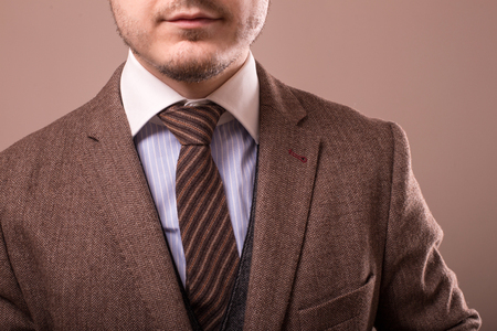 Man with retro camera in tweed vintage dressの写真素材