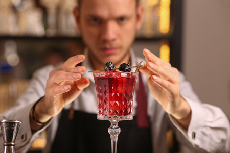 Red fresh alcoholic cocktail. Old fashioned cocktailの写真素材