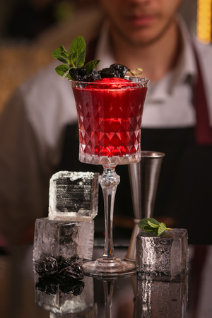 Red fresh alcoholic cocktail. Old fashioned cocktailの写真素材