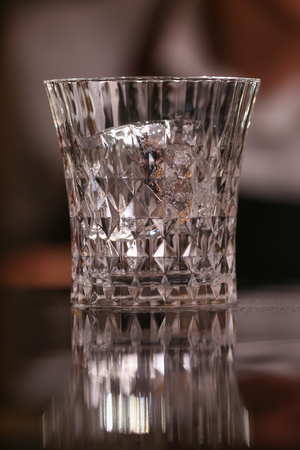 Fitzgerald alcohol cocktail on black background surface. Barmen is making Fitzgerald cocktailの写真素材