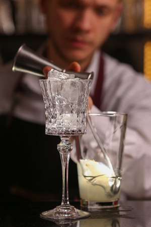 Margarita alcohol cocktail with lime ice barmenの写真素材