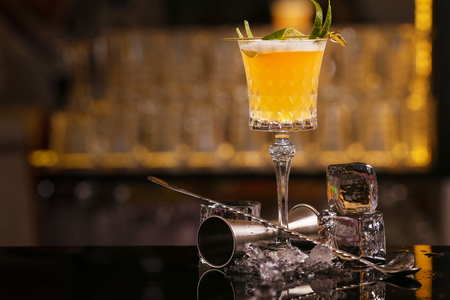 Bartender is making Pisco sour alcohol cocktail drinkの写真素材