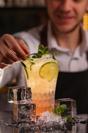 Mule alcohol cocktail drink with lime slice and mint leavesの写真素材