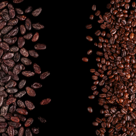 Roasted beans. Cocoa beans and coffee beans isolated on black background.