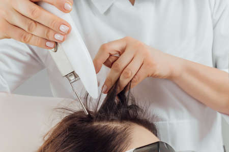 Young pretty woman receiving treatments in beauty salons.