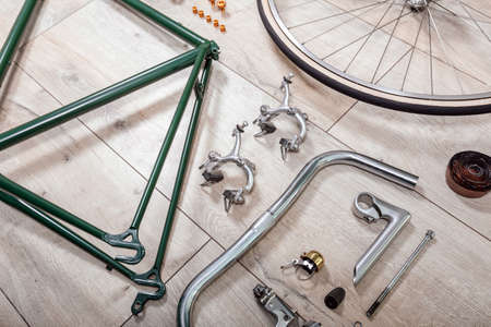 Vintage green bicycle frame and parts top view