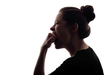 Silhouette of woman that scream because of anger. Isolated portrait on white background