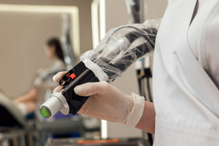 Epilation hair removal procedure on a womans body. Removing unwanted body hair.の写真素材