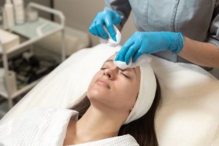 Relaxing facial treatment in a serene spa setting during a soothing wellness sessionの写真素材