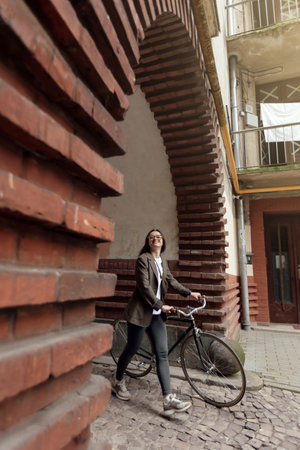Cycling in a retro style in a charming urban settingの写真素材