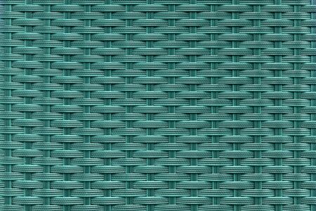 Interlacing plastic fibers in turquoise color. Design texture.の写真素材