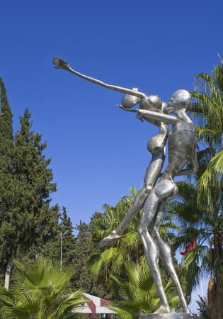 KEMER, TURKEY - OCT 5, 2017: Monument of man and woman in a Kungulu park.のeditorial素材