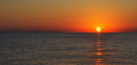 Golden sunrise at Mediterranean Sea - Kemer, Turkey.の写真素材