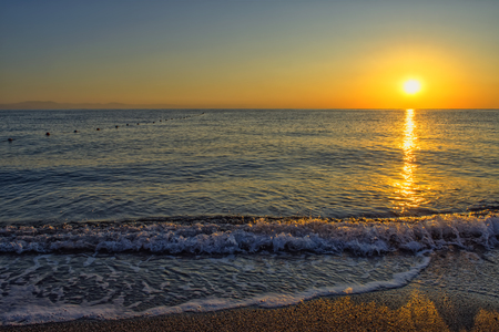 Golden sunrise at Mediterranean Sea - Kemer, Turkey.の写真素材