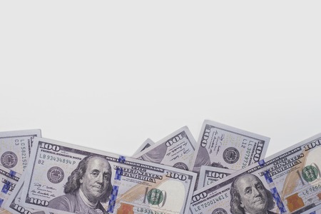 Hundreds dollars of USA and white background.の写真素材