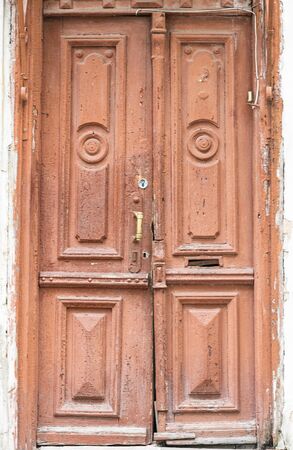 vintage wooden door painted redの写真素材