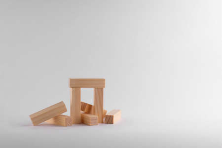 Blocks wooden bricks on a white background from the board gameの写真素材