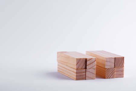 Blocks wooden bricks on a white background from the board gameの写真素材