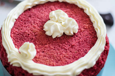 Red velvet cake decorated with cream. Red velvet close-upの写真素材