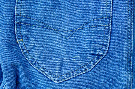 A pocket on a denim skirt close-up. Material background.の写真素材