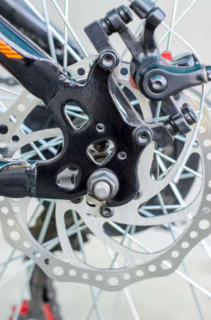 Rear disc brake system close-up on a bicycle.