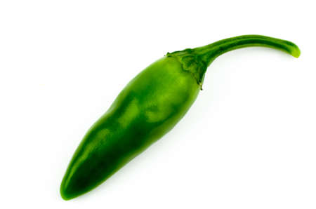 Green peppers on a white background close-up side view.