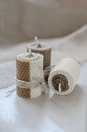 Handmade decorative wax candles with honey aroma. Decorations for the interior.の写真素材
