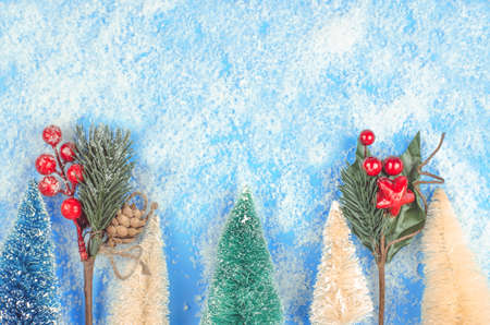 Christmas blank for advertising a product. Christmas decor on a blue background with place for text.の写真素材