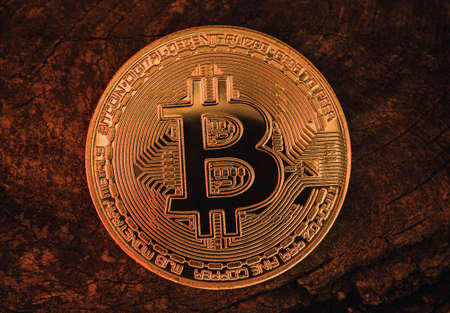 Close-up of a bitcoin, copy space. world cryptocurrency. The financial system of the future