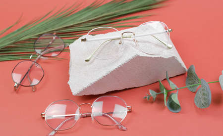 Glasses for vision of different types on a colored backgroundの写真素材