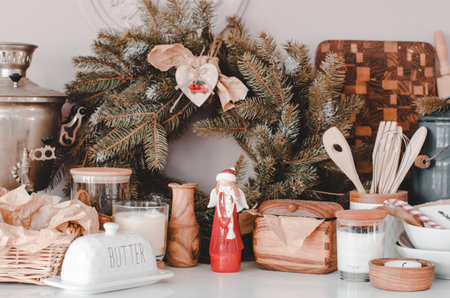 Christmas decor on a white table in a bright room, selective focusの写真素材