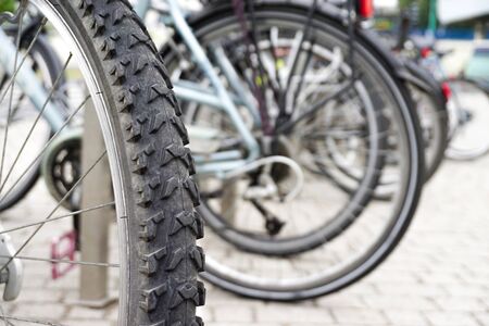 wheel of bicycle  on a background bicyclesの写真素材