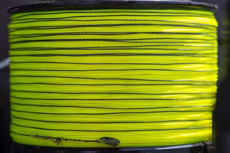 Fishing line on reel fishing coil, high magnification macro, close up view, carp fishing rigsの写真素材