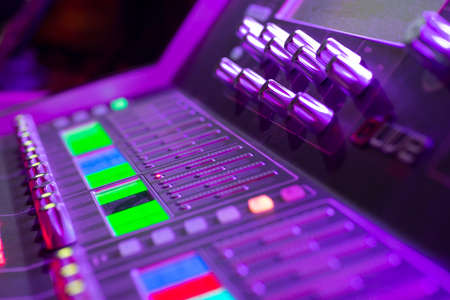 Audio mixer console, dj stand close up photo during party event, presentation, celebration, audio controlsの写真素材