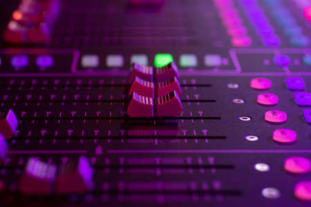 Audio mixer console, dj stand close up photo during party event, presentation, celebration, audio...
