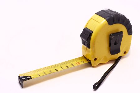 Tape-line isolated on white background. Tape measure for construction work.の写真素材