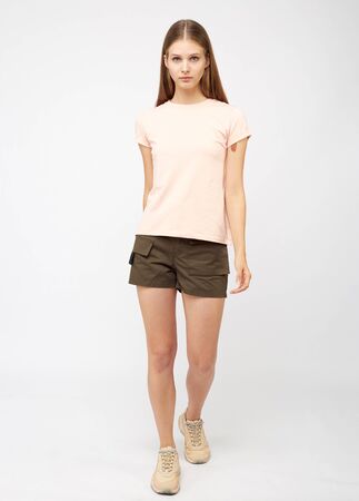 Teenager girl in khaki cargo shortsの写真素材