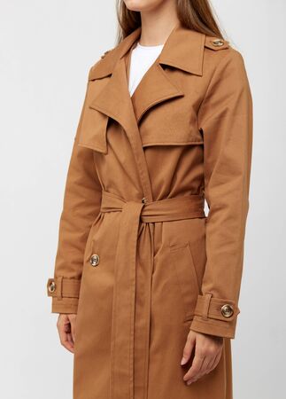 Female trench coat camel color isolated on white background.の写真素材