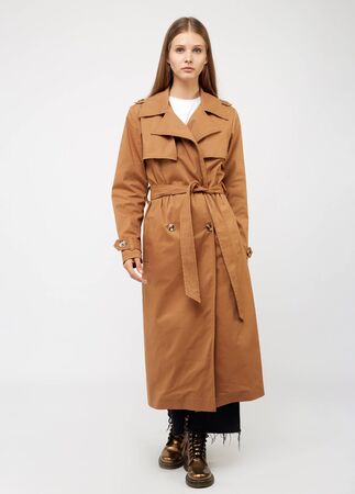 Female trench coat camel color isolated on white background.の写真素材