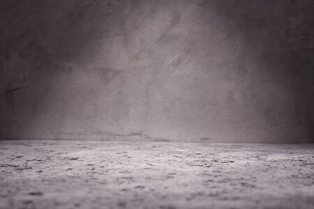 Empty room with concrete wall, grey background.の写真素材