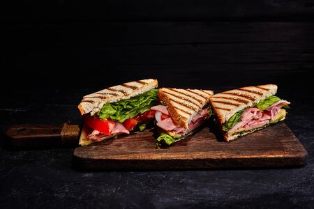 Sandwich bread tomato, lettuce and yellow cheeseの写真素材