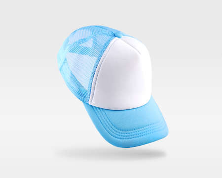White , blue baseball cap isolated on white background.の写真素材