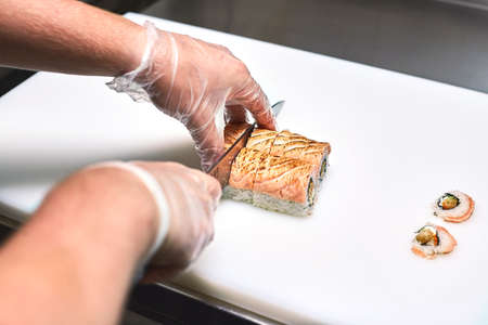 Process of making sushi on white background