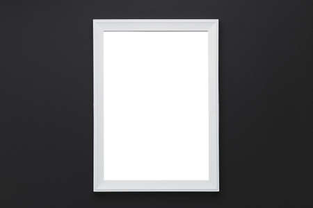 White picture frame on black background with clipping path.
