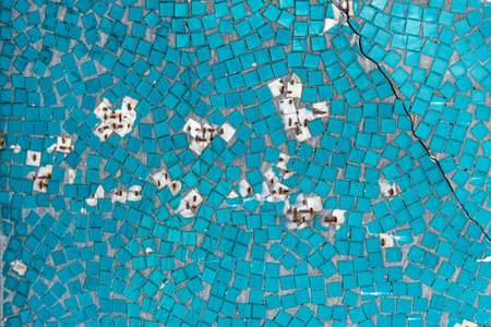 Old white mosaic wall with hole and rust, background from old mosaic.の写真素材