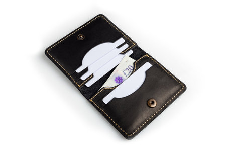Black leather wallet with blank cards, isolated on white backgroundの写真素材